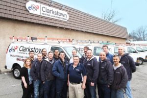 The clarkstown hvac team outside their building