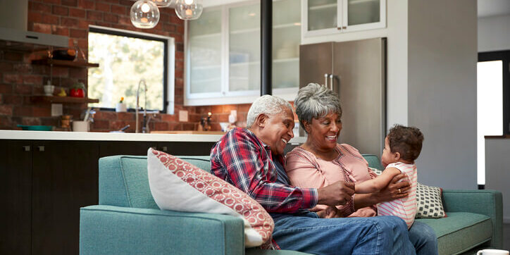 elderly couple with grandchild enjoying clean indoor air
