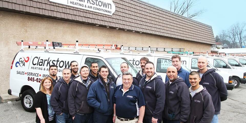 The clarkstown hvac team outside their building
